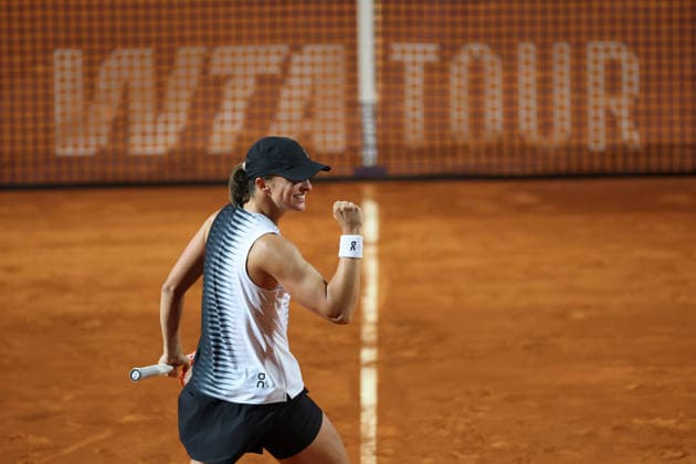 (260515) -- ROME, May 15, 2026 -- Iga Swiatek of Poland celebrates a point during the women s singles semifinal match between Elina Svitolina of Ukraine and Iga Swiatek of Poland at the WTA, Tennis Damen Italian Open in Rome, Italy, May 14, 2026. ) (SP)ITALY-ROME-TENNIS-WTA-ITALIAN OPEN-ELINA SVITOLINA VS IGA SWIATEK LixJing 