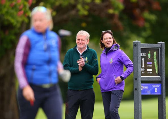 REPRO FREE *PRESS RELEASE NO REPRODUCTION FEE* EDITORIAL USE ONLY Flogas Irish Women s Amateur Open, Newlands Golf Club, Dublin 15 5 2026 Esme Murphy after teeing off as Captains Dermot Devlin and Louise Halpin look on Dermot Devlin and Louise Halpin 15 5 2026  Copyright: x INPHO TomxO™Hanlonx V1467074