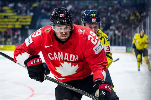 260515 Parker Wotherspoon of Canada and Rasmus Asplund of Sweden during the 2026 IIHF Ice hockey, Eishockey World Championship, WM, Weltmeisterschaft match between Canada and Sweden on May 15, 2026 in Fribourg. Photo: Jesper Zerman BILDBYRAN kod JZ JZ0714 ishockey ice hockey ishockey-vm 2026 vm 2026 iihf world championship kanada canada sverige sweden bbeng Copyright: JESPERxZERMAN BB260515BB172