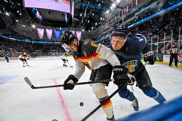 ZURICH, SWITZERLAND - MAY 15: Jesse Puljujarvi of Finland and Kai Wissmann of Germany in a battle along the boards during the 2026 IIHF Ice hockey, Eishockey World Championship, WM, Weltmeisterschaft Switzerland game between Finland and Germany at Swiss Life Arena on May 15, 2026 in Zurich, Zurich. Zurich Swiss Life Arena Zurich Switzerland *** ZURICH, SWITZERLAND MAY 15 Jesse Puljujarvi of Finland and Kai Wissmann of Germany in a battle along the boards during the 2026 IIHF Ice Hockey World Championship Switzerland game between Finland and Germany at Swiss Life Arena on May 15, 2026 in Zurich, Zurich Zurich Swiss Life Arena Zurich Switzerland Copyright: xJustPictures.ch AndreaxBrancax jp-en-EuSpIm-JP7_ANB_Fin_Ger_15052026_1407