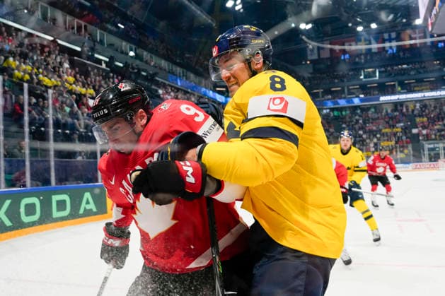 FRIBOURG, SWITZERLAND - MAY 15: John Tavares of Canada L) against Robert Hagg of Sweden R) during the 2026 IIHF Ice hockey, Eishockey World Championship, WM, Weltmeisterschaft Switzerland game between Canada and Sweden at BCF Arena on May 15, 2026 in Fribourg, Fribourg. Fribourg BCF Arena Fribourg Switzerland Copyright: xJustPictures.ch JarixPestelaccix jp-en-EuSpIm-JP6_JAR_Canada_Sweden_15May2026_00044
