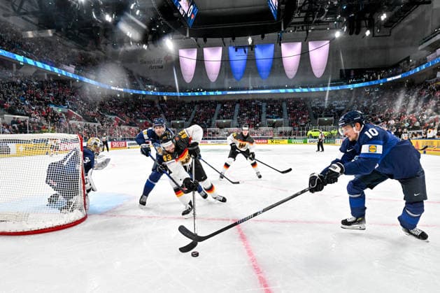 ZURICH, SWITZERLAND - MAY 15: Andreas Eder of Germany in a battle for the puck against Mikko Lehtonen of Finland L) and Henri Jokiharju of Finland R) during the 2026 IIHF Ice hockey, Eishockey World Championship, WM, Weltmeisterschaft Switzerland game between Finland and Germany at Swiss Life Arena on May 15, 2026 in Zurich, Zurich. Zurich Swiss Life Arena Zurich Switzerland Copyright: xJustPictures.ch AndreaxBrancax jp-en-EuSpIm-JP7_ANB_Fin_Ger_15052026_1681