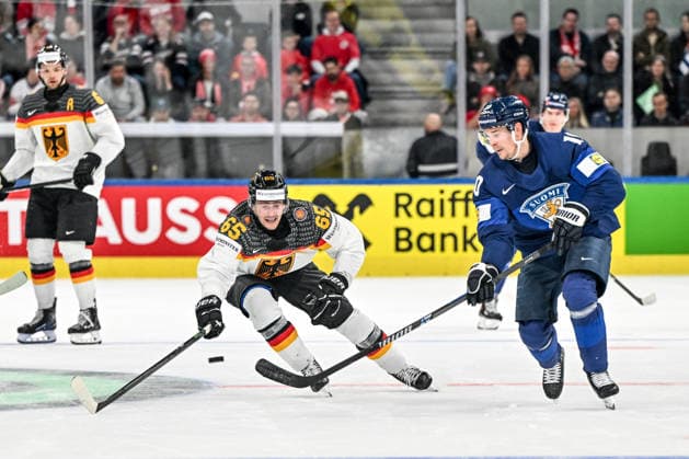 ZURICH, SWITZERLAND - MAY 15: Henri Jokiharju of Finland plays the puck chased by Marc Michaelis of Germany during the 2026 IIHF Ice hockey, Eishockey World Championship, WM, Weltmeisterschaft Switzerland game between Finland and Germany at Swiss Life Arena on May 15, 2026 in Zurich, Zurich. Zurich Swiss Life Arena Zurich Switzerland *** ZURICH, SWITZERLAND MAY 15 Henri Jokiharju of Finland plays the puck chased by Marc Michaelis of Germany during the 2026 IIHF Ice Hockey World Championship Switzerland game between Finland and Germany at Swiss Life Arena on May 15, 2026 in Zurich, Zurich Zurich Swiss Life Arena Zurich Switzerland Copyright: xJustPictures.ch AndreaxBrancax jp-en-EuSpIm-JP7_ANB_Fin_Ger_15052026_8753