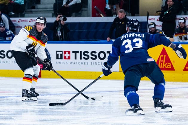 ZURICH, SWITZERLAND - MAY 15: Marc Michaelis (Germany, 65) in the battle for the puck with Nikolas Matinpalo (Finland, 33) during the Preliminary Round - Group A Match 1 between Finland and Germany at the IIHF Ice hockey, Eishockey World Championship, WM, Weltmeisterschaft 2026, Swiss Life Arena on May 15, 2026 in Zurich, Switzerland. Zurich Switzerland Copyright: xTimoxSteinx