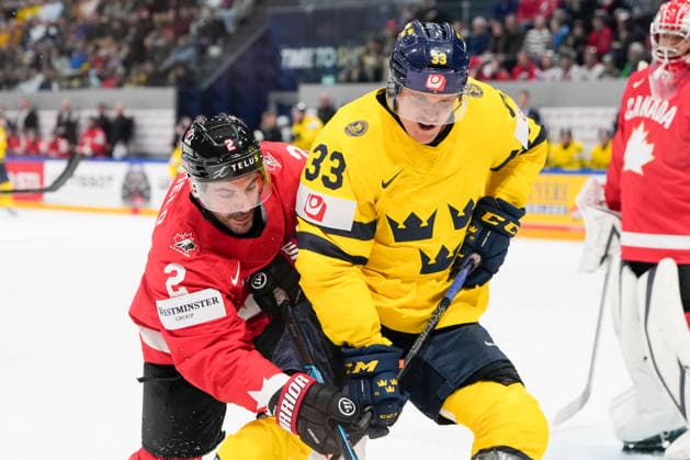 FRIBOURG, SWITZERLAND - MAY 15: Jakob Silfverberg of Sweden R) against Dylan Demelo of Canada L) during the 2026 IIHF Ice hockey, Eishockey World Championship, WM, Weltmeisterschaft Switzerland game between Canada and Sweden at BCF Arena on May 15, 2026 in Fribourg, Fribourg. Fribourg BCF Arena Fribourg Switzerland Copyright: xJustPictures.ch JarixPestelaccix jp-en-EuSpIm-JP6_JAR_Canada_Sweden_15May2026_00171