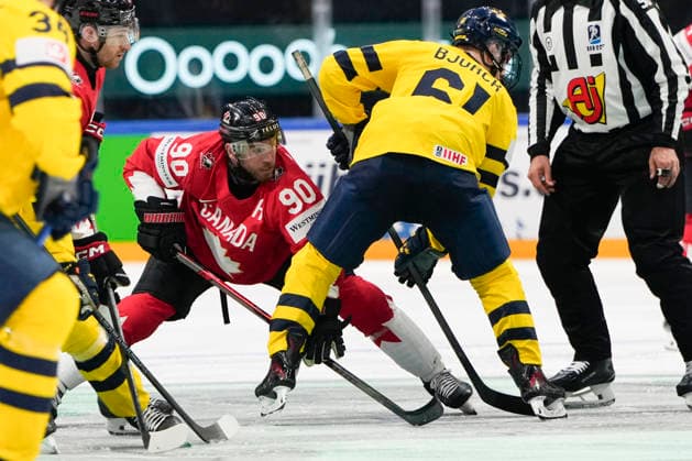 FRIBOURG, SWITZERLAND - MAY 15: Ryan O™reilly of Canada L) against Viggo Bjorck of Sweden during the 2026 IIHF Ice hockey, Eishockey World Championship, WM, Weltmeisterschaft Switzerland game between Canada and Sweden at BCF Arena on May 15, 2026 in Fribourg, Fribourg. Fribourg BCF Arena Fribourg Switzerland *** FRIBOURG, SWITZERLAND MAY 15 Ryan O™reilly of Canada L against Viggo Bjorck of Sweden during the 2026 IIHF Ice Hockey World Championship Switzerland game between Canada and Sweden at BCF Arena on May 15, 2026 in Fribourg, Fribourg Fribourg BCF Arena Fribourg Switzerland Copyright: xJustPictures.ch JarixPestelaccix jp-en-EuSpIm-JP6_JAR_Canada_Sweden_15May2026_00230
