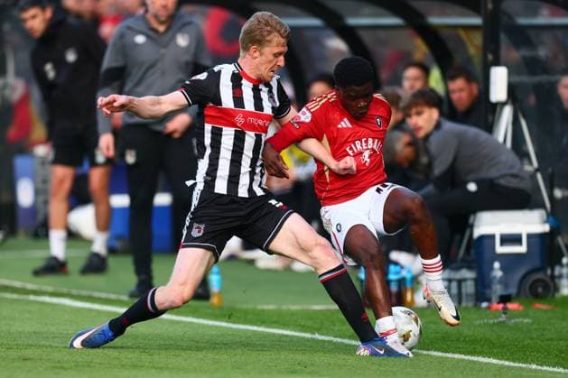 Harvey Rodgers of Grimsby Town and Kelly N Mai of Salford City Salford City v Grimsby Town, EFL Sky Bet League Two, Play-Off Semi Final, Second Leg, Football, Peninsula Stadium, Salford, UK - 15 May 2026Salford Peninsula Stadium United Kingdom EDITORIAL USE ONLY No use with unauthorised audio, video, data, fixture lists, club league logos or live services. Online in-match use limited to 120 images, no video emulation. No use in betting, games or single club league player publications. Copyright: xPaulxCurrie Shutterstockx 16876823bn
