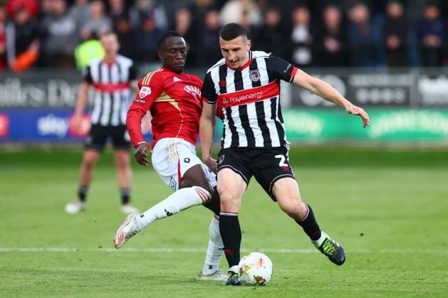 Daniel Udoh of Salford City and Maldini Kacurri of Grimsby Towb Salford City v Grimsby Town, EFL Sky Bet League Two, Play-Off Semi Final, Second Leg, Football, Peninsula Stadium, Salford, UK - 15 May 2026Salford Peninsula Stadium United Kingdom EDITORIAL USE ONLY No use with unauthorised audio, video, data, fixture lists, club league logos or live services. Online in-match use limited to 120 images, no video emulation. No use in betting, games or single club league player publications. Copyright: xPaulxCurrie Shutterstockx 16876823bv