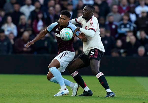 Birmingham, England, 15th May 2026. Ollie Watkins of Aston Villa (L) is challenged by Ibrahima Konate of Liverpool during the Aston Villa vs Liverpool Premier League match at Villa Park, Birmingham. Picture credit should read: Andrew Yates Sportimage EDITORIAL USE ONLY. No use with unauthorised audio, video, data, fixture lists, club league logos or live services. Online in-match use limited to 120 images, no video emulation. No use in betting, games or single club league player publications. SPI_014_AY_ASTON_VILLA_LIVERPOOL SPI-4802-0014