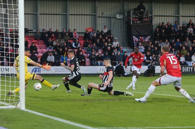 Daniel Udoh of Salford City scores their sides first goal Salford City v Grimsby Town, EFL Sky Bet League Two, Play-Off Semi Final, Second Leg, Football, Peninsula Stadium, Salford, UK - 15 May 2026Salford Peninsula Stadium United Kingdom EDITORIAL USE ONLY No use with unauthorised audio, video, data, fixture lists, club league logos or live services. Online in-match use limited to 120 images, no video emulation. No use in betting, games or single club league player publications. Copyright: xPhilxOldham Shutterstockx 16876824ad