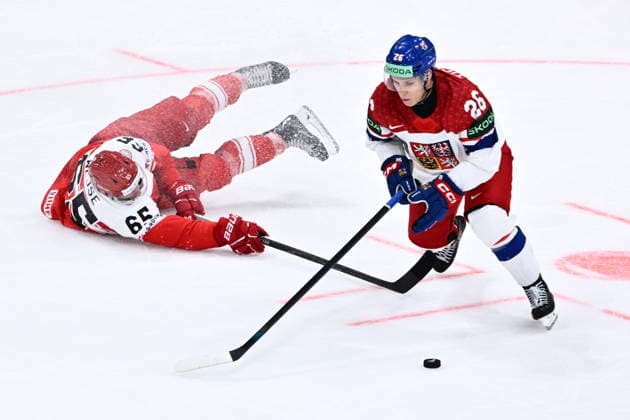 From left Christian Wejse of Denmark and Jiri Tichacek of Czech Republic in action during the IIHF World Championship, WM, Weltmeisterschaft Group B match Czech Republic vs Denmark on May 15, 2026, Fribourg, Switzerland. (CTKxPhoto RadekxPetrasek) CTKPhotoP2026051508710  CTKPhotoP2026051508710