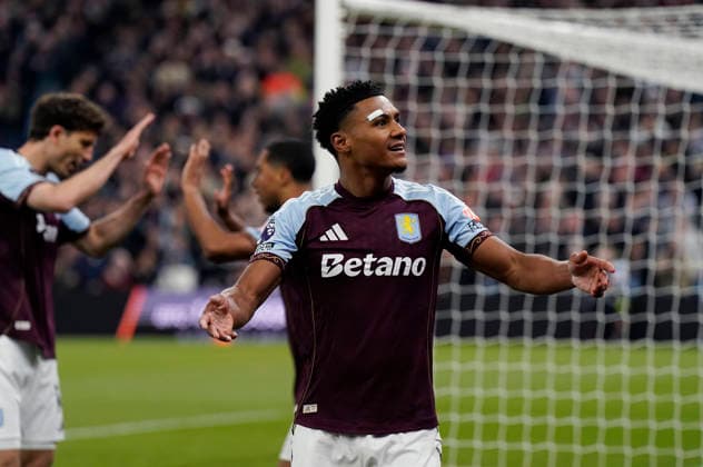 Birmingham, England, 15th May 2026. Ollie Watkins of Aston Villa celebrates after scoring the second goal during the Aston Villa vs Liverpool Premier League match at Villa Park, Birmingham. Picture credit should read: Andrew Yates Sportimage EDITORIAL USE ONLY. No use with unauthorised audio, video, data, fixture lists, club league logos or live services. Online in-match use limited to 120 images, no video emulation. No use in betting, games or single club league player publications. SPI_026_AY_ASTON_VILLA_LIVERPOOL SPI-4802-0025