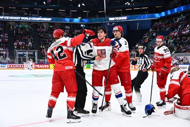 From left Phillip Bruggisser of Denmark and Jaroslav Chmelar of Czech Republic in action during the IIHF World Championship, WM, Weltmeisterschaft Group B match Czech Republic vs Denmark on May 15, 2026, Fribourg, Switzerland. (CTKxPhoto RadekxPetrasek) CTKPhotoP2026051509078  CTKPhotoP2026051509078