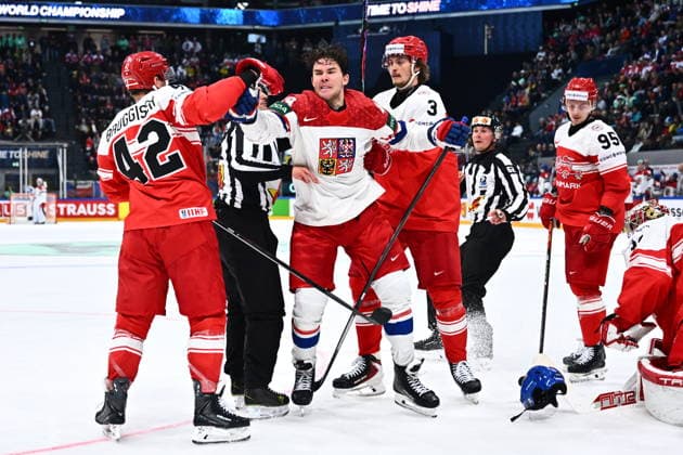 From left Phillip Bruggisser of Denmark and Jaroslav Chmelar of Czech Republic in action during the IIHF World Championship, WM, Weltmeisterschaft Group B match Czech Republic vs Denmark on May 15, 2026, Fribourg, Switzerland. (CTKxPhoto RadekxPetrasek) CTKPhotoP2026051509139  CTKPhotoP2026051509139