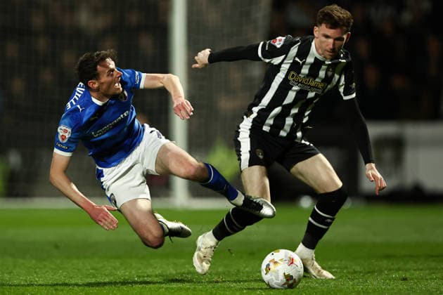 Nottingham, England, 15th May 2026. Conor Grant of Notts County battles with Liam Mandeville of Chesterfield during the Notts County vs Chesterfield Sky Bet League 2 match at Meadow Lane, Nottingham. Picture credit should read: Jake Youle Sportimage EDITORIAL USE ONLY. No use with unauthorised audio, video, data, fixture lists, club league logos or live services. Online in-match use limited to 120 images, no video emulation. No use in betting, games or single club league player publications. SPI_028_JY_Notts_County_Chesterfield SPI-4814-0024