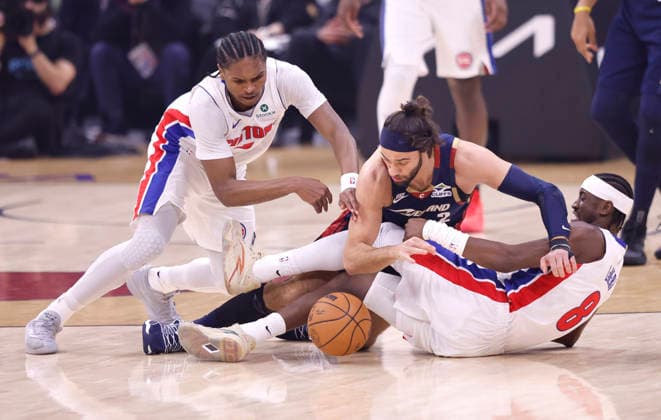 Detroit Pistons Ausar Thompson (9) and Caris LeVert (8) battles Cleveland Cavaliers Max Strus (2) for a loose ball in the first quarter in Cleveland, Ohio Friday May 15, 2026.  CLE20260515106 AARONxJOSEFCZYK