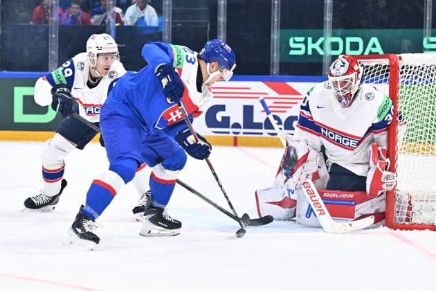 L-R Kristian Ostby (NOR), Adam Liska (SVK) and goalkeeper Tobias Normann (NOR) in action during the 2026 IIHF World Championship, WM, Weltmeisterschaft Group B, match Slovakia vs Norway, on May 16, 2026, Fribourg, Switzerland. (CTKxPhoto RadekxPetrasek) CTKPhotoP2026051602609  CTKPhotoP2026051602609