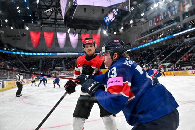 ZURICH, SWITZERLAND - MAY 16: Simeon Schwinger of Austria hits Joseph Hazeldine of Great Britain along the boards during the 2026 IIHF Ice hockey, Eishockey World Championship, WM, Weltmeisterschaft Switzerland game between Great Britain and Austria at Swiss Life Arena on May 16, 2026 in Zurich, Zurich. Zurich Swiss Life Arena Zurich Switzerland Copyright: xJustPictures.ch AndreaxBrancax jp-en-EuSpIm-JP7_ANB_GB_AU_16052026_3188