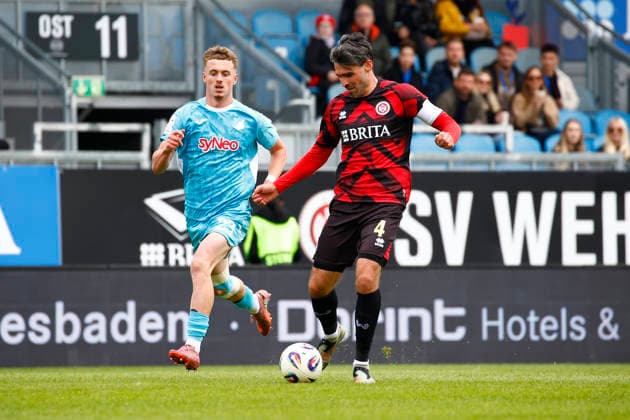 16.05.2026, xavx, Fussball 3.Liga, SV Wehen Wiesbaden - TSG Hoffenheim U23 v.l. Alex Honajzer (TSG 1899 Hoffenheim II), Sascha Mockenhaupt (SV Wehen Wiesbaden) (DFL DFB REGULATIONS PROHIBIT ANY USE OF PHOTOGRAPHS as IMAGE SEQUENCES and or QUASI-VIDEO) Wiesbaden