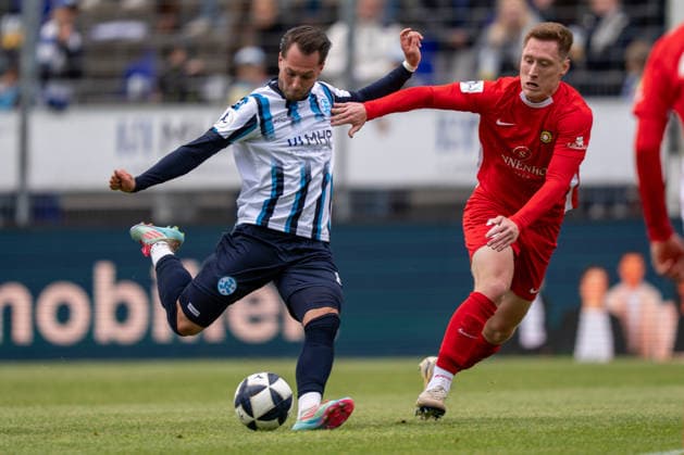 Torchance durch David Tomic (Stuttgarter Kickers, 08) im Duell mit Leon Maier (SG Sonnenhof Großaspach, 20), Stuttgarter Kickers vs. SG Sonnenhof Großaspach, Fussball, Regionalliga Suedwest, 34. Spieltag, 16.05.2026 Stuttgart-Degerloch Baden-Wuerttemberg Deutschland