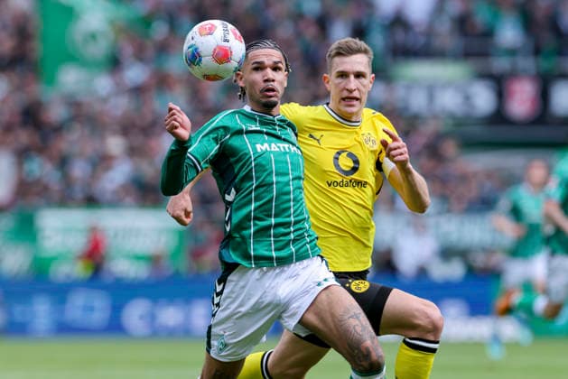 Justin Njinmah (Werder Bremen) und Nico Schlotterbeck (Borussia Dortmund) kaempfen um den Ball, Bundesliga, SV Werder Bremen v Borussia Dortmund, Weserstadion am 16. May 2026 in Bremen, Deutschland. (Foto von Marco Steinbrenner DeFodi Images) Justin Njinmah (Werder Bremen) und Nico Schlotterbeck (Borussia Dortmund) battle for the ball, Bundesliga, SV Werder Bremen v Borussia Dortmund, Weserstadion, May 16, 2026 in Bremen, Germany. (Photo by Marco Steinbrenner DeFodi Images) DFL regulations prohibit any use of photographs as image sequences and or quasi-video. -
