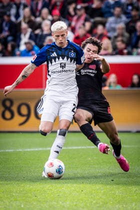 LEVERKUSEN, GERMANY - MAY 16, 2026 : Montrell Amare Culbreath (Bayer 04 Leverkusen, 42) tackles Albert Gronbaek (Hamburger SV, 23) during the German Bundesliga match on gameday 34 between Bayer 04 Leverkusen vs. Hamburger SV at BayArena on May 16, 2026 in Leverkusen, Germany. DFL REGULATIONS PROHIBIT ANY USE OF PHOTOGRAPHS AS IMAGE SEQUENCES AND OR QUASI-VIDEO. Northrhine-Westphalia Germany Copyright: xAxelxKohringx