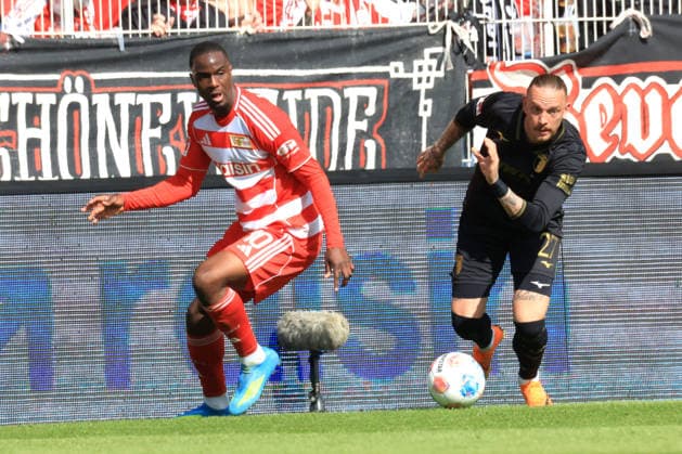 DEU, DFL, 1. FBL, 1.FC Union vs. FC Augsburg, 16.05.2026, Stadion Alte Foersterei, Berlin, DEU, DFL, 1. FBL, 1.FC Union vs. FC Augsburg, im Bild: Ilyas Ansah (1.FC Union Berlin 10), Marius Wolf (FC Augsburg 27) DFL - regulations prohibit any use of Photographs as image sequences and or quasi-video