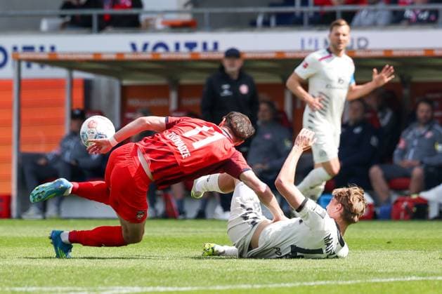Aktion zwischen Budu Zivzivadze 12 (1FC Heidenheim 1846) und Kacper Potulski 48 (1. FSV Mainz 05), 1. FC Heidenheim vs. 1. FSV Mainz 05, Fussball, Maenner, Bundesliga, DFL, Saison 2025 2026, 34. Spieltag, Rueckrunde, 16.05.2026 DFB regulations prohibit any use of photographs as image sequences and or quasi-video Heidenheim Baden-Wuerttemberg Deutschland