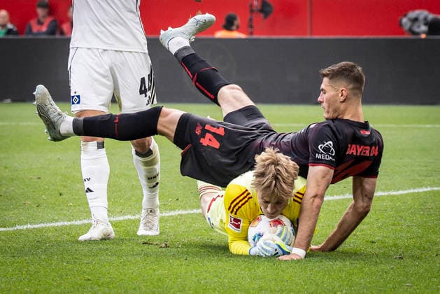 LEVERKUSEN, GERMANY - MAY 16, 2026 : Keeper Sander Tangvik (Hamburger SV, 12) and Patrik Schick (Bayer 04 Leverkusen, 14) during the German Bundesliga match on gameday 34 between Bayer 04 Leverkusen vs. Hamburger SV at BayArena on May 16, 2026 in Leverkusen, Germany. DFL REGULATIONS PROHIBIT ANY USE OF PHOTOGRAPHS AS IMAGE SEQUENCES AND OR QUASI-VIDEO. Northrhine-Westphalia Germany Copyright: xAxelxKohringx