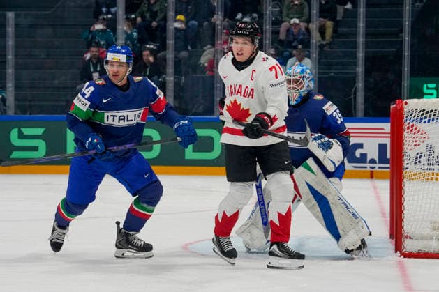 FRIBOURG, SWITZERLAND - MAY 16: Macklin Celebrini of Canada C) against goalkeeper Davide Fadani of Italy R) and Gregorio Gios of Italy L) during the 2026 IIHF Ice hockey, Eishockey World Championship, WM, Weltmeisterschaft Switzerland game between Italy and Canada at BCF Arena on May 16, 2026 in Fribourg, Fribourg. Fribourg BCF Arena Fribourg Switzerland Copyright: xJustPictures.ch JarixPestelaccix jp-en-EuSpIm-JP6_JAR_Italy_Canada_16May2026_00012