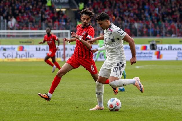 Eren Dinkci 8 (1FC Heidenheim 1846) in Aktion mit Nadiem Amiri 10 (1. FSV Mainz 05), 1. FC Heidenheim vs. 1. FSV Mainz 05, Fussball, Maenner, Bundesliga, DFL, Saison 2025 2026, 34. Spieltag, Rueckrunde, 16.05.2026 DFB regulations prohibit any use of photographs as image sequences and or quasi-video Heidenheim Baden-Wuerttemberg Deutschland