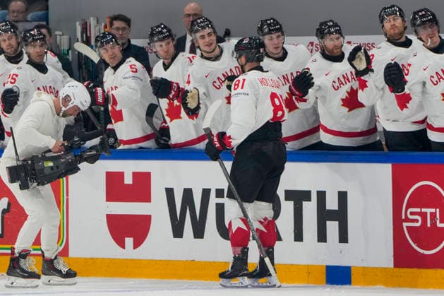 FRIBOURG, SWITZERLAND - MAY 16: Dylan Holloway of Canada celebrates his goal with the bench during the 2026 IIHF Ice hockey, Eishockey World Championship, WM, Weltmeisterschaft Switzerland game between Italy and Canada at BCF Arena on May 16, 2026 in Fribourg, Fribourg. Fribourg BCF Arena Fribourg Switzerland Copyright: xJustPictures.ch JarixPestelaccix jp-en-EuSpIm-JP6_JAR_Italy_Canada_16May2026_00035