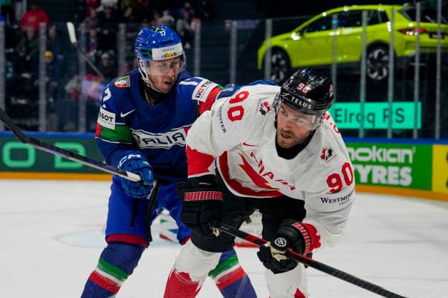 FRIBOURG, SWITZERLAND - MAY 16: Carmine Buono of Italy L) against Ryan O™reilly of Canada R) during the 2026 IIHF Ice hockey, Eishockey World Championship, WM, Weltmeisterschaft Switzerland game between Italy and Canada at BCF Arena on May 16, 2026 in Fribourg, Fribourg. Fribourg BCF Arena Fribourg Switzerland Copyright: xJustPictures.ch JarixPestelaccix jp-en-EuSpIm-JP6_JAR_Italy_Canada_16May2026_00044