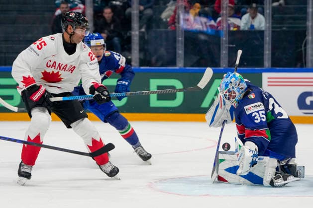 FRIBOURG, SWITZERLAND - MAY 16: Darnell Nurse of Canada L) against goalkeeper Davide Fadani of Italy R) during the 2026 IIHF Ice hockey, Eishockey World Championship, WM, Weltmeisterschaft Switzerland game between Italy and Canada at BCF Arena on May 16, 2026 in Fribourg, Fribourg. Fribourg BCF Arena Fribourg Switzerland Copyright: xJustPictures.ch JarixPestelaccix jp-en-EuSpIm-JP6_JAR_Italy_Canada_16May2026_00049