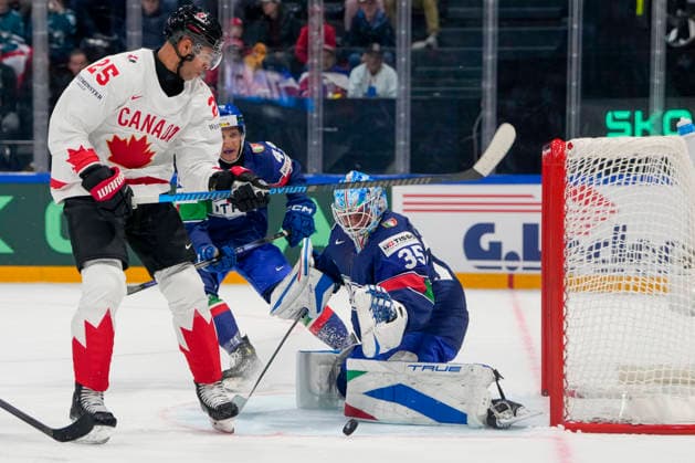 FRIBOURG, SWITZERLAND - MAY 16: Darnell Nurse of Canada L) against goalkeeper Davide Fadani of Italy R) during the 2026 IIHF Ice hockey, Eishockey World Championship, WM, Weltmeisterschaft Switzerland game between Italy and Canada at BCF Arena on May 16, 2026 in Fribourg, Fribourg. Fribourg BCF Arena Fribourg Switzerland Copyright: xJustPictures.ch JarixPestelaccix jp-en-EuSpIm-JP6_JAR_Italy_Canada_16May2026_00050