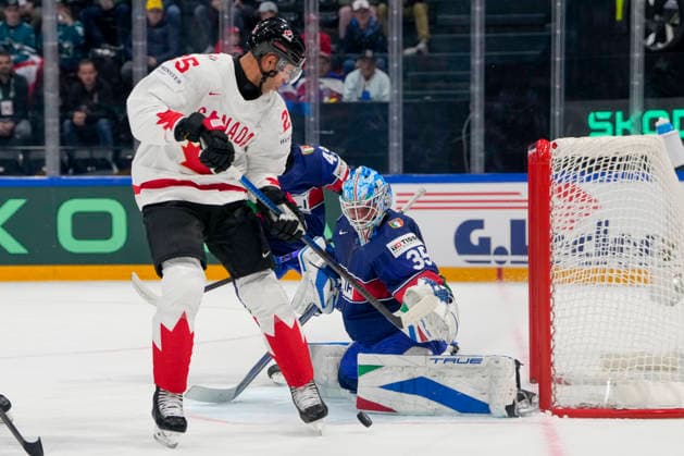 FRIBOURG, SWITZERLAND - MAY 16: Darnell Nurse of Canada L) against goalkeeper Davide Fadani of Italy R) during the 2026 IIHF Ice hockey, Eishockey World Championship, WM, Weltmeisterschaft Switzerland game between Italy and Canada at BCF Arena on May 16, 2026 in Fribourg, Fribourg. Fribourg BCF Arena Fribourg Switzerland Copyright: xJustPictures.ch JarixPestelaccix jp-en-EuSpIm-JP6_JAR_Italy_Canada_16May2026_00051