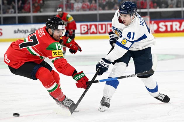 LKS 20260516 Ville Heinola (R) of Finland vies with Roland Kiss of Hungary during the 2026 IIHF Ice hockey, Eishockey World Championships preliminary round group A match between Hungary and Finland in Zurich on May 16, 2026. - RONI REKOMAA Zürich Switzerland 0HVS4k2YxI4  Copyright: xRonixRekomaax 0HVS4k2YxI4