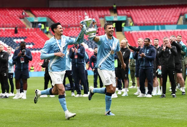 London, England, 16th May 2026. Tijjani Reijnders of Manchester City and Rodri of Manchester City celebrate with the trophy during the Chelsea vs Manchester City FA Cup Final match at Wembley Stadium, London. Picture credit should read: David Klein Sportimage EDITORIAL USE ONLY. No use with unauthorised audio, video, data, fixture lists, club league logos or live services. Online in-match use limited to 120 images, no video emulation. No use in betting, games or single club league player publications. SPI_117_DK_Chelsea_Manchester_City SPI-4803-0117