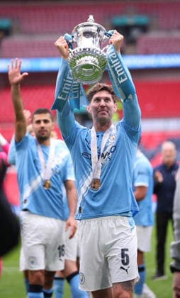 Chelsea v Manchester City - Emirates FA Cup Final John Stones of Manchester City celebrates with Trophy after winning the Emirates FA Cup Final match between Chelsea and Manchester City on May 16, 2026 in London, England. WARNING! This Photograph May Only Be Used For Newspaper And Or Magazine Editorial Purposes. May Not Be Used For Publications Involving 1 player, 1 Club Or 1 Competition Without Written Authorisation From Football DataCo Ltd. For Any Queries, Please Contact Football DataCo Ltd on +44 (0) 207 864 9121 London Wembley Stadium England United Kingdom Copyright: xAllstarxPicturexLibraryxLtdx