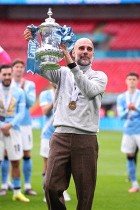 Chelsea v Manchester City - Emirates FA Cup Final Pep Guardiola, Manager of Manchester City celebrates with Trophy after winning the Emirates FA Cup Final match between Chelsea and Manchester City on May 16, 2026 in London, England. WARNING! This Photograph May Only Be Used For Newspaper And Or Magazine Editorial Purposes. May Not Be Used For Publications Involving 1 player, 1 Club Or 1 Competition Without Written Authorisation From Football DataCo Ltd. For Any Queries, Please Contact Football DataCo Ltd on +44 (0) 207 864 9121 London Wembley Stadium England United Kingdom Copyright: xAllstarxPicturexLibraryxLtdx