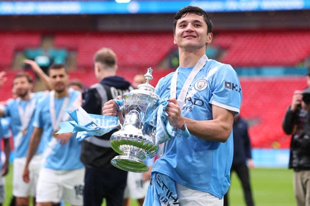 Chelsea v Manchester City - Emirates FA Cup Final Abdukodir Khusanov of Manchester City celebrates with Trophy after winning the Emirates FA Cup Final match between Chelsea and Manchester City on May 16, 2026 in London, England. WARNING! This Photograph May Only Be Used For Newspaper And Or Magazine Editorial Purposes. May Not Be Used For Publications Involving 1 player, 1 Club Or 1 Competition Without Written Authorisation From Football DataCo Ltd. For Any Queries, Please Contact Football DataCo Ltd on +44 (0) 207 864 9121 London Wembley Stadium England United Kingdom Copyright: xAllstarxPicturexLibraryxLtdx