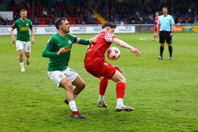 Fußball I Herren I Saison 2025 2026 I Regionalliga Nord I 34.Spieltag I Eintracht Norderstedt - HSC Hannover I 16.05.2026 Marcel Langer (14, HSC Hannover) Lucas Schulze (21, FC Eintracht Norderstedt) Norderstedt Edmund Plambeck Stadion Schleswig-Holstein Deutschland Copyright: xLobeca RalfxHomburgx