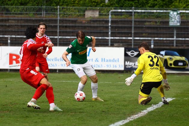 Fußball I Herren I Saison 2025 2026 I Regionalliga Nord I 34.Spieltag I Eintracht Norderstedt - HSC Hannover I 16.05.2026 Fabian Grau (4, FC Eintracht Norderstedt) Luc-Elias Fender (9, HSC Hannover) trifft 0-6 Lars Huxsohl (32, FC Eintracht Norderstedt) Norderstedt Edmund Plambeck Stadion Schleswig-Holstein Deutschland Copyright: xLobeca RalfxHomburgx