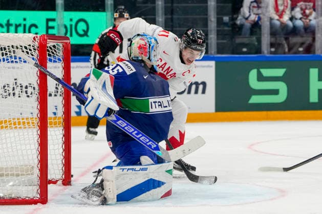 FRIBOURG, SWITZERLAND - MAY 16: goalkeeper Davide Fadani of Italy L) saves on Macklin Celebrini of Canada R) during the 2026 IIHF Ice hockey, Eishockey World Championship, WM, Weltmeisterschaft Switzerland game between Italy and Canada at BCF Arena on May 16, 2026 in Fribourg, Fribourg. Fribourg BCF Arena Fribourg Switzerland Copyright: xJustPictures.ch JarixPestelaccix jp-en-EuSpIm-JP6_JAR_Italy_Canada_16May2026_00097
