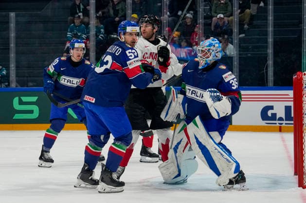 FRIBOURG, SWITZERLAND - MAY 16: Gabriel Vilardi of Canada between Alex Trivellato of Italy 2nd L) and goalkeeper Davide Fadani of Italy R) during the 2026 IIHF Ice hockey, Eishockey World Championship, WM, Weltmeisterschaft Switzerland game between Italy and Canada at BCF Arena on May 16, 2026 in Fribourg, Fribourg. Fribourg BCF Arena Fribourg Switzerland Copyright: xJustPictures.ch JarixPestelaccix jp-en-EuSpIm-JP6_JAR_Italy_Canada_16May2026_00039