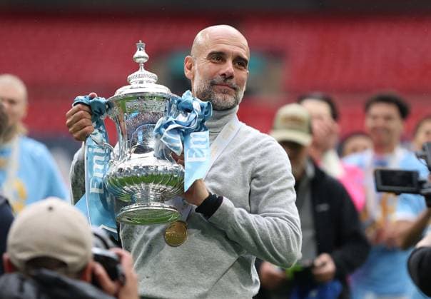 . - Chelsea v Manchester City, The Emirates FA Cup Final 2026, Wembley Stadium, London, England, 16th May 2026. Daniel Weir Crystal Pix Josep Guardiola Manager of Manchester City holds aloft The Emirates FA Cup Trophy in celebration after winning the 2026 FA Cup Final. - Chelsea v Manchester City, The Emirates FA Cup Final 2026, Wembley Stadium, London, England, 16th May 2026. Daniel Weir Crystal Pix London Wembley Stadium England Copyright: xDanielxWeirx CP_Chelsea_Manchester_City_160526_DW44