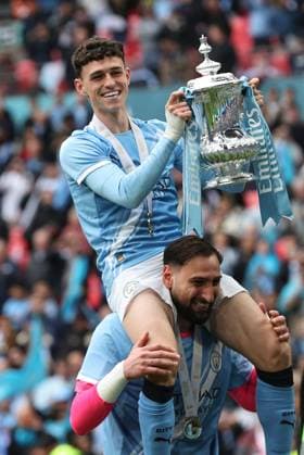 Chelsea v Manchester City. Phil Foden of Manchester City with the trophy at the end of the FA Cup Final Chelsea v Manchester City. Football. The Emirates FA Cup Final. Wembley Stadium, London, UK. 16 MAY 2026Wembley Wembley Stadium LONDON United Kingdom EDITORIAL USE ONLY No use with unauthorised audio, video, data, fixture lists, club league logos or live services. Online in-match use limited to 120 images, no video emulation. No use in betting, games or single club league player publications.  Copyright: xJASONPIX Shutterstockx 16878747bm