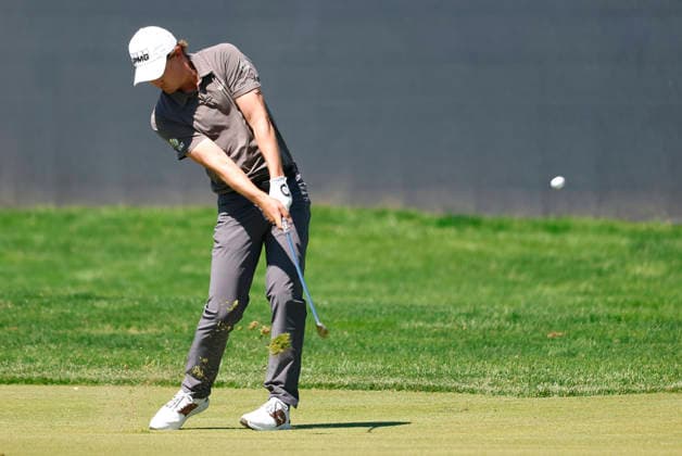 Maverick McNealy hits an approach shot on the 1st fairway during the third round of the 2026 PGA, Golf Herren Championship at Aronimink Golf Club in Newtown Square, Pennsylvania, on Saturday, May 16, 2026.  PHI20260516843 LAURENCExKESTERSON