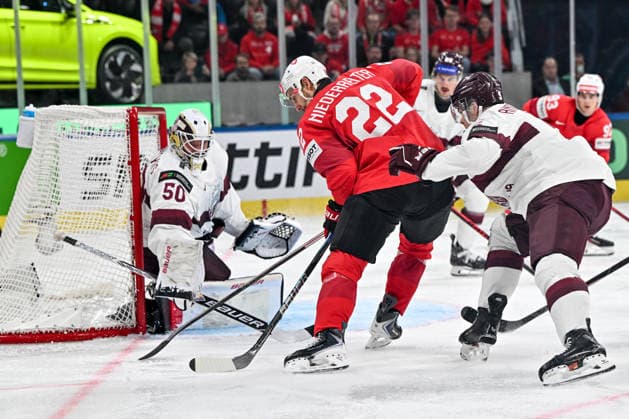 ZURICH, SWITZERLAND - MAY 16: Nino Niederreiter of Switzerland in action against goalkeeper Kristers Gudlevskis of Latvia during the 2026 IIHF Ice hockey, Eishockey World Championship, WM, Weltmeisterschaft Switzerland game between Switzerland and Latvia at Swiss Life Arena on May 16, 2026 in Zurich, Zurich. Zurich Swiss Life Arena Zurich Switzerland *** ZURICH, SWITZERLAND MAY 16 Nino Niederreiter of Switzerland in action against goalkeeper Kristers Gudlevskis of Latvia during the 2026 IIHF Ice Hockey World Championship Switzerland game between Switzerland and Latvia at Swiss Life Arena on May 16, 2026 in Zurich, Zurich Zurich Swiss Life Arena Zurich Switzerland Copyright: xJustPictures.ch AndreaxBrancax jp-en-EuSpIm-JP7_ANB_Sui_Lat_16052026_4723