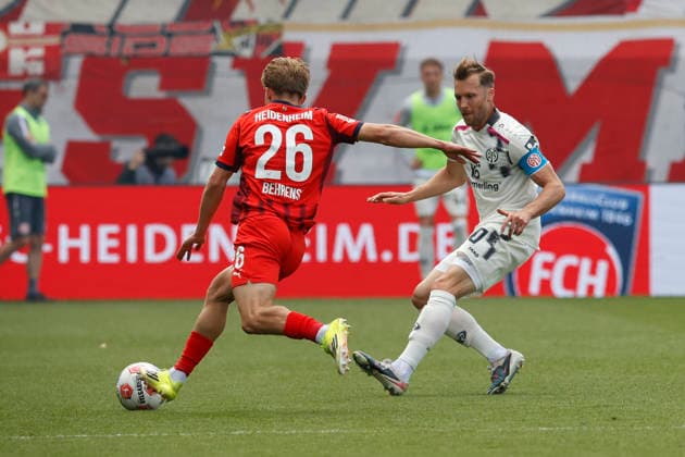 Fussball, 1. Bundesliga, 34. Spieltag, 2025 2026, 1. FC Heidenheim vs. 1. FSV Mainz 05, 16.05.2026, Voith-Arena, Heidenheim, Deutschland, Hennes BEHRENS 1. FC Heidenheim 26 li. im Zweikampf mit Silvan WIDMER 1. FSV Mainz 05 30 Heidenheim Voith-Arena Baden-Württemberg Deutschland Copyright: xGaetanoxDixRosax